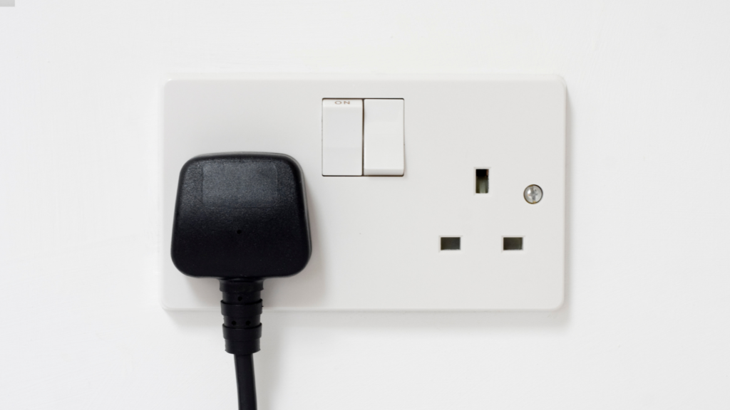 A plug in an electric socket